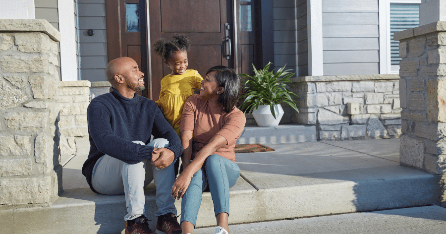 Family on front porch during the spring