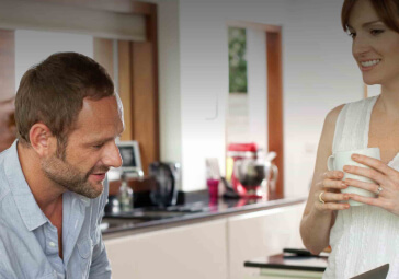 Pro installing a product for a homeowner