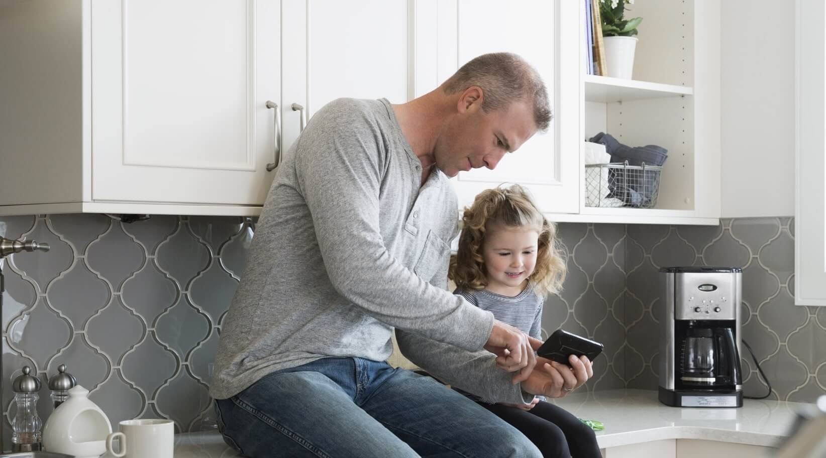 Father and child enjoying comfortable smart home