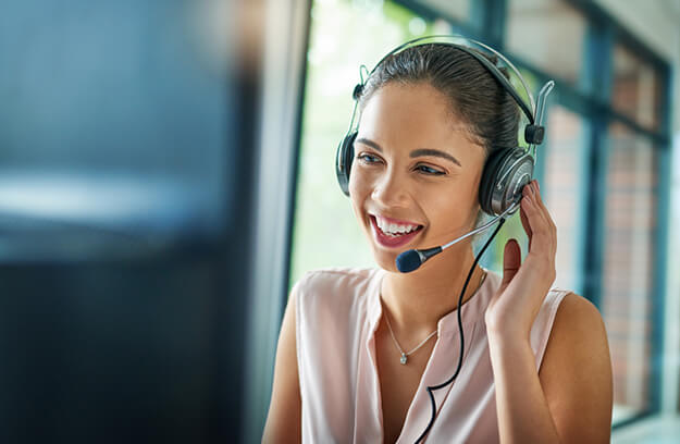 Smiling woman wearing headset