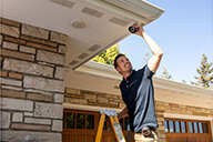 Dealer, A installer is installing the Resideo Outdoor Camera 