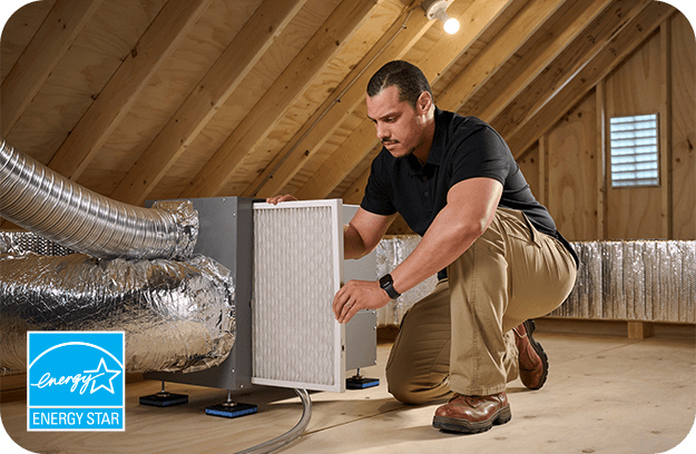 A Resideo pro installs a filter